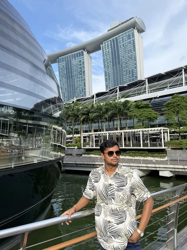 Akshat with Singapore skyline